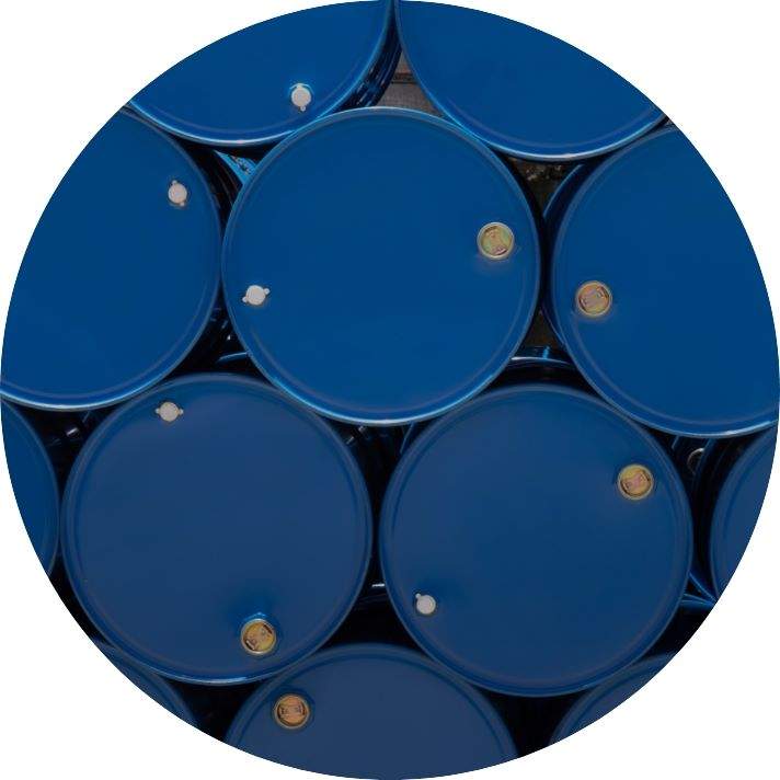 A top-down view of several blue barrels