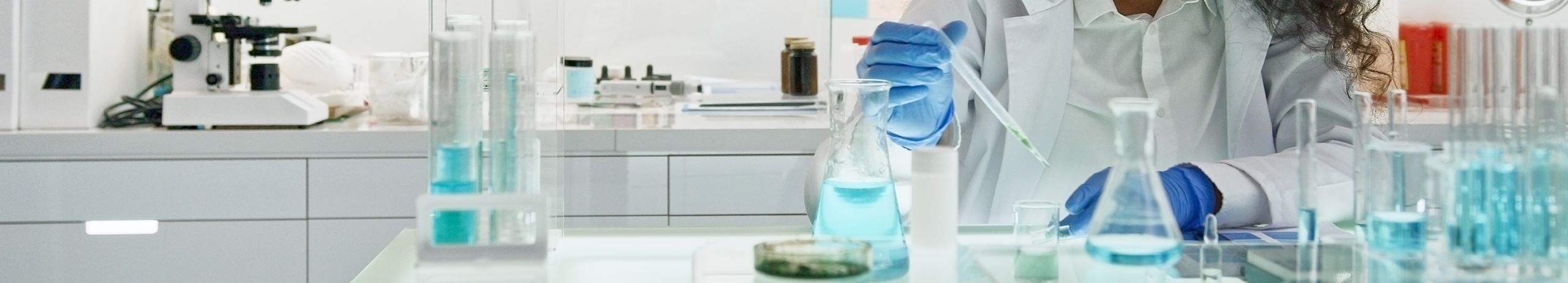 A person working with laboratory equipment